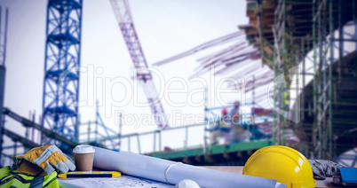 Composite image of panoramic shot of architecture equipment on table