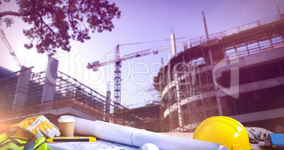 Composite image of panoramic shot of architecture equipment on table