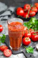 Tomato juice and fresh tomatoes