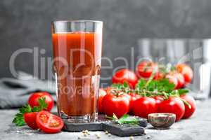 Tomato juice and fresh tomatoes