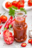 Tomato ketchup, chilli sauce, tomatos puree with chili pepper, tomatoes and garlic