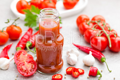 Tomato ketchup, chilli sauce, tomatos puree with chili pepper, tomatoes and garlic