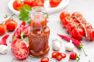 Tomato ketchup, chilli sauce, tomatos puree with chili pepper, tomatoes and garlic