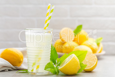 Lemonade. Drink with fresh lemons. Lemon cocktail with juice.