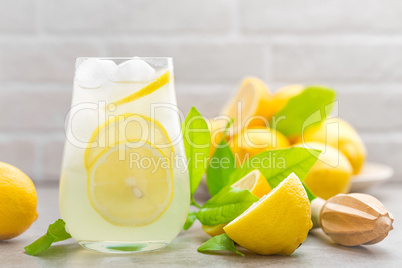 Lemonade. Drink with fresh lemons. Lemon cocktail with juice and ice.