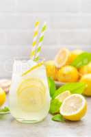 Lemonade. Drink with fresh lemons. Lemon cocktail with juice and ice.