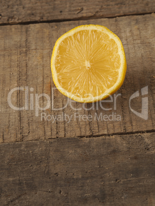 Organic lemon fruit on wood