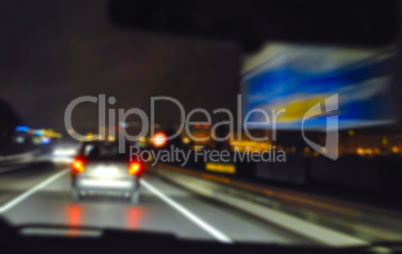 Blurred night traffic scene on the highway