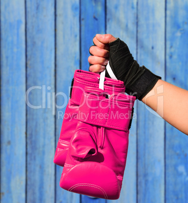 Leather pink gloves for kickboxing in female hands