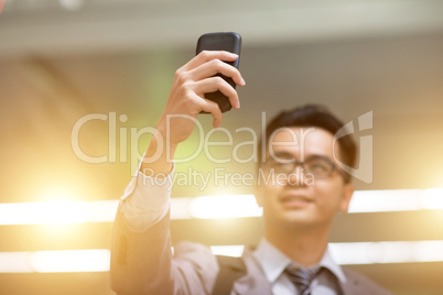 Businessman taking selfie