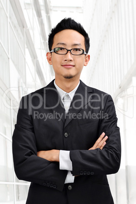 Confident Asian businessman