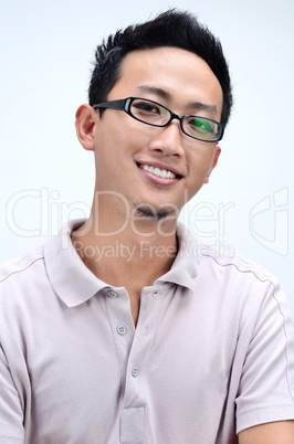 Young Asian male smiling.