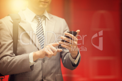 Business man using smartphone