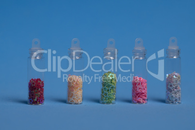 Set of colorful nail makeup glitters