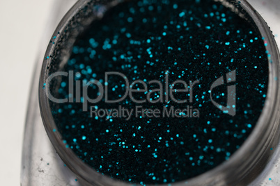 Teal nail makeup glitter