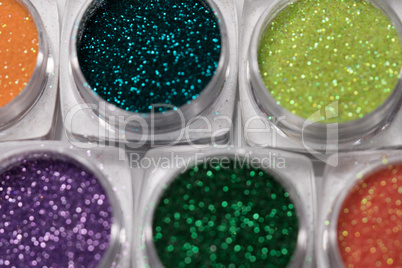 Set of colorful nail makeup glitter