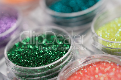 Set of colorful nail makeup glitter