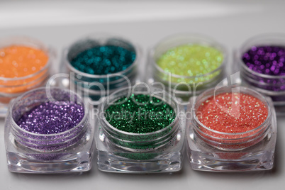 Set of colorful nail makeup glitter