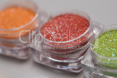 Set of colorful nail makeup glitter