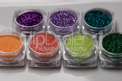 Set of colorful nail makeup glitter