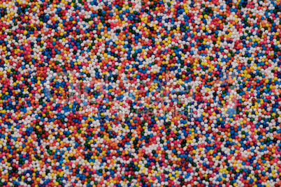 Colorful sprinkles sugar background