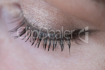 Closeup woman's eye with soft makeup