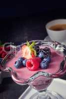 delicious pudding with  wild berry