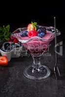 delicious pudding with  wild berry