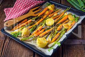 caramelised carrots, spring onions and baked potatoes