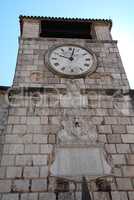Tower with a clock in the old town of Kotor (Montenegro)