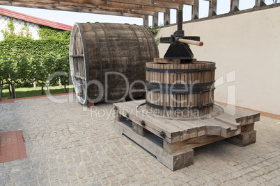 Grape harvest: old Wine press in a winery photo