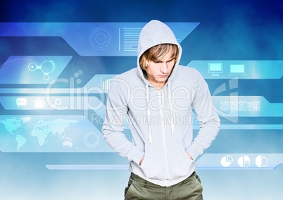 Hacker with a grey sweatshirt in front of blue digital background