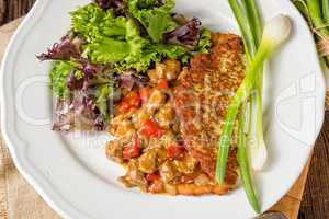 Hungarian goulash with potato pancakes