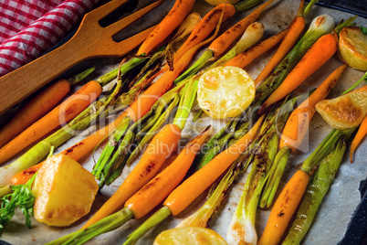 caramelised carrots, spring onions and baked potatoes