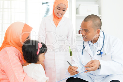 Sick children consulting doctor