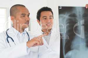 Medical doctors checking on x-ray image