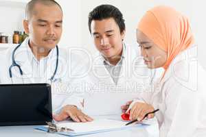 Doctors meeting at hospital office.