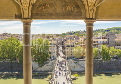 Saint Angel bridge over the river Tiber with tourists