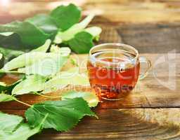 Herbal tea with linden in a transparent mug