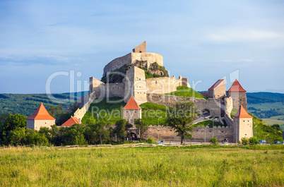 Old medieval fortress on top of the hill, Rupea village located