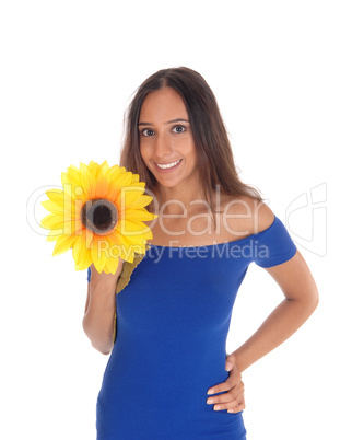 Smiling woman with sunflower.