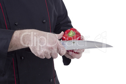 Chef with a knife and paprika