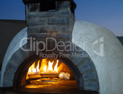 Outdoor stove for baking bread .