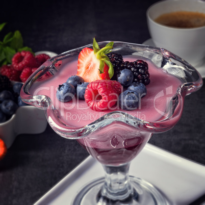 delicious pudding with wild berry