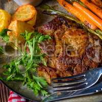 Grilled steak with vegetables and fried potatoes