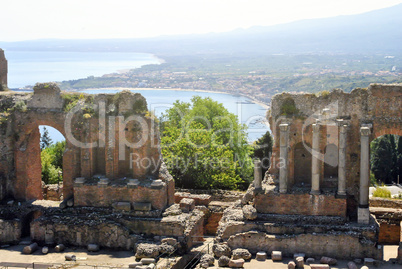 the Ancient Theatre of Taormina with Etna Mountain and mediterra