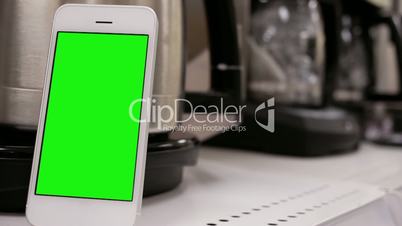 Motion of display coffee machine with green screen phone for your ad