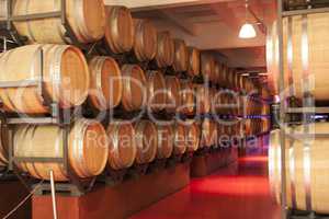 Old wine barrels in a wine cellar photo