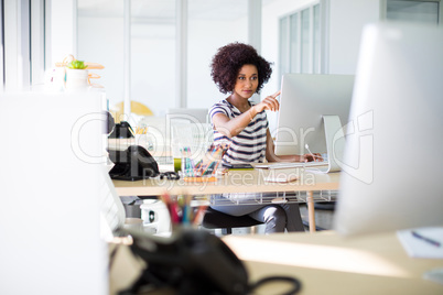 Female executive working at her desk