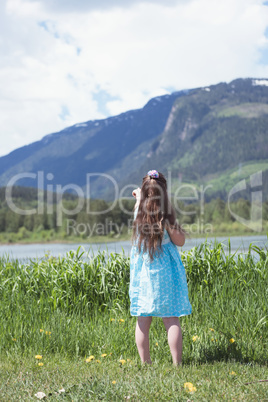 Rear view of girl looking at view